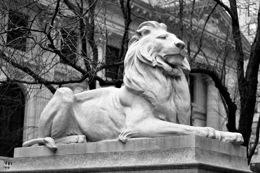 A stone statue of a lion