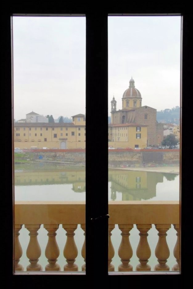 Buildings of Florence viewed through a window