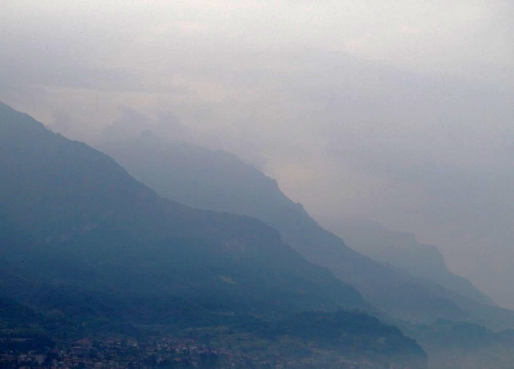 Fog-shrouded cliffs at dusk