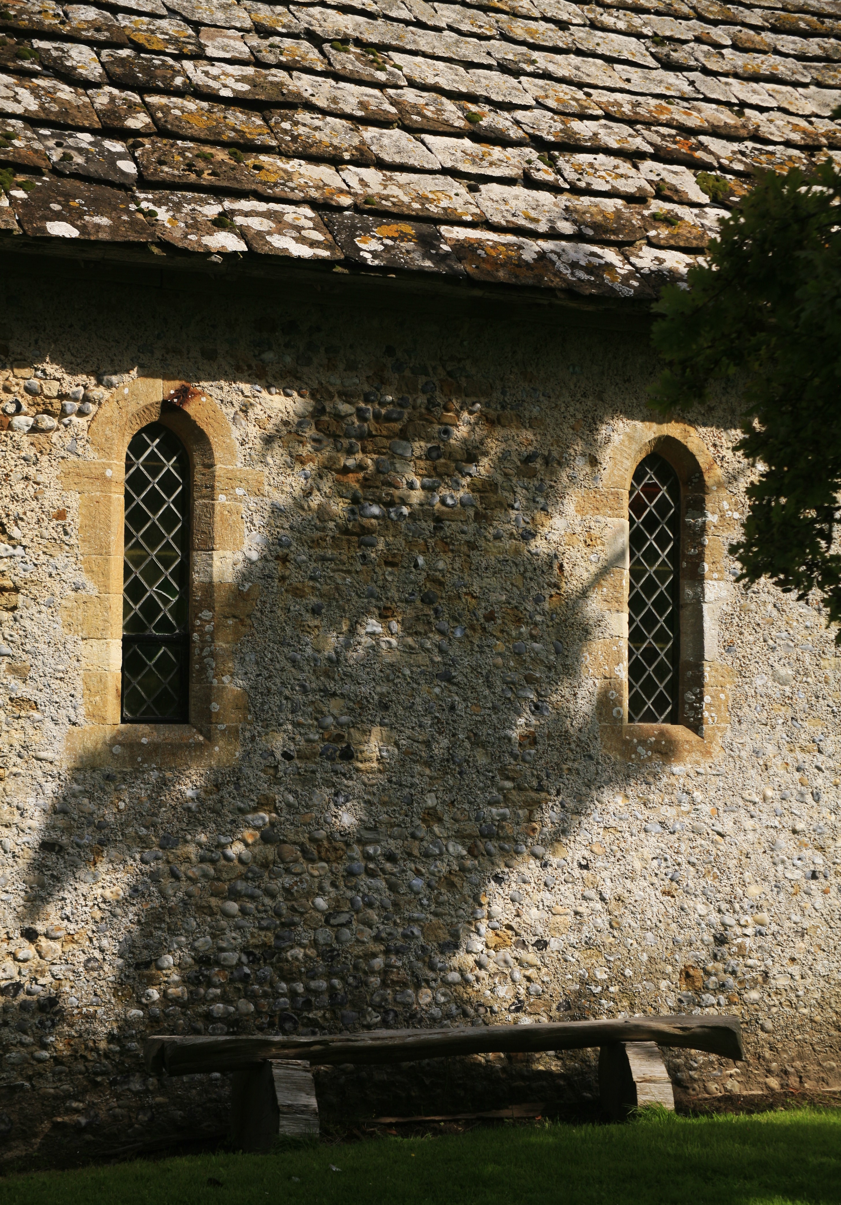 A wall of a stone cottage