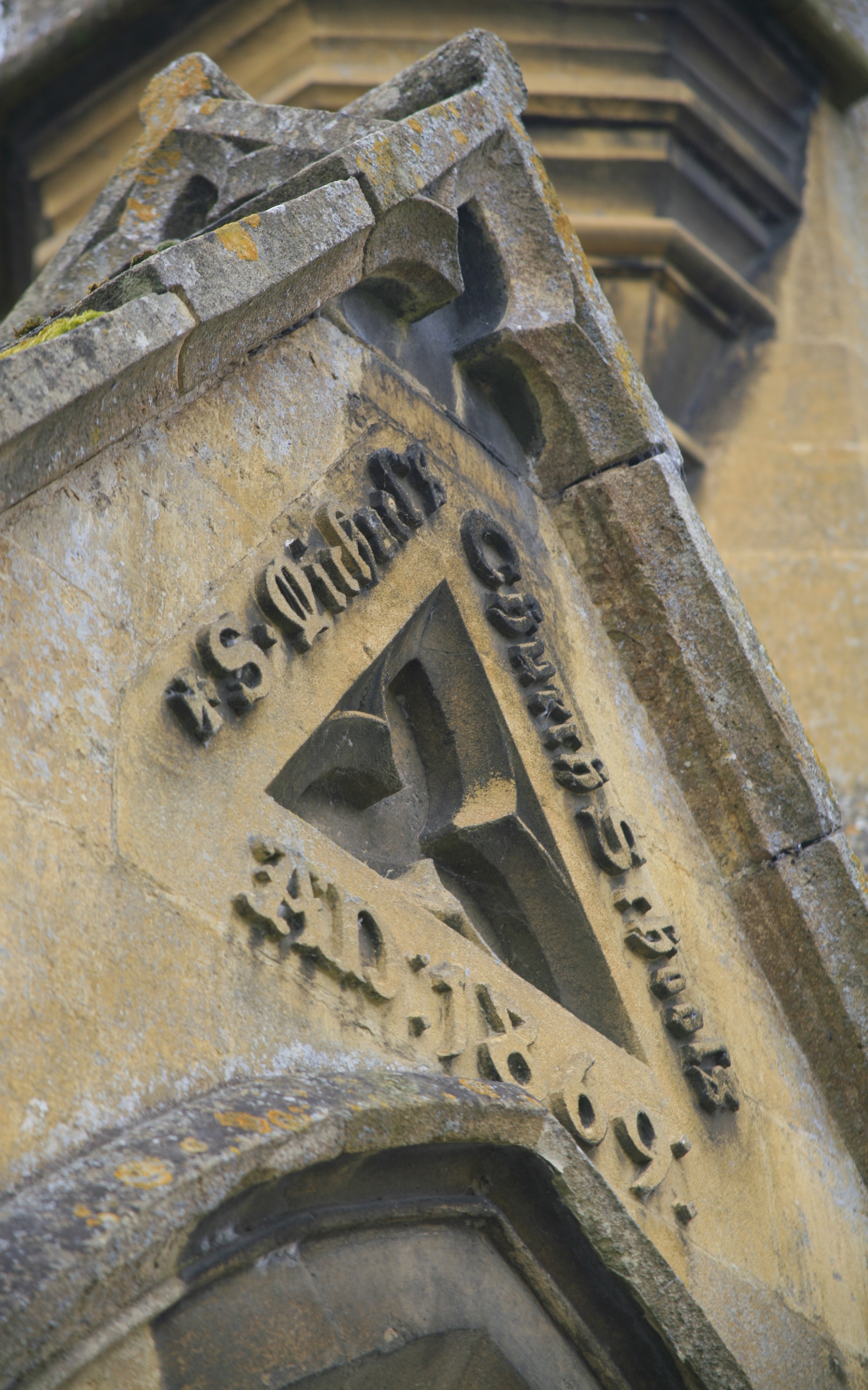 The peak of a stone roof of a church